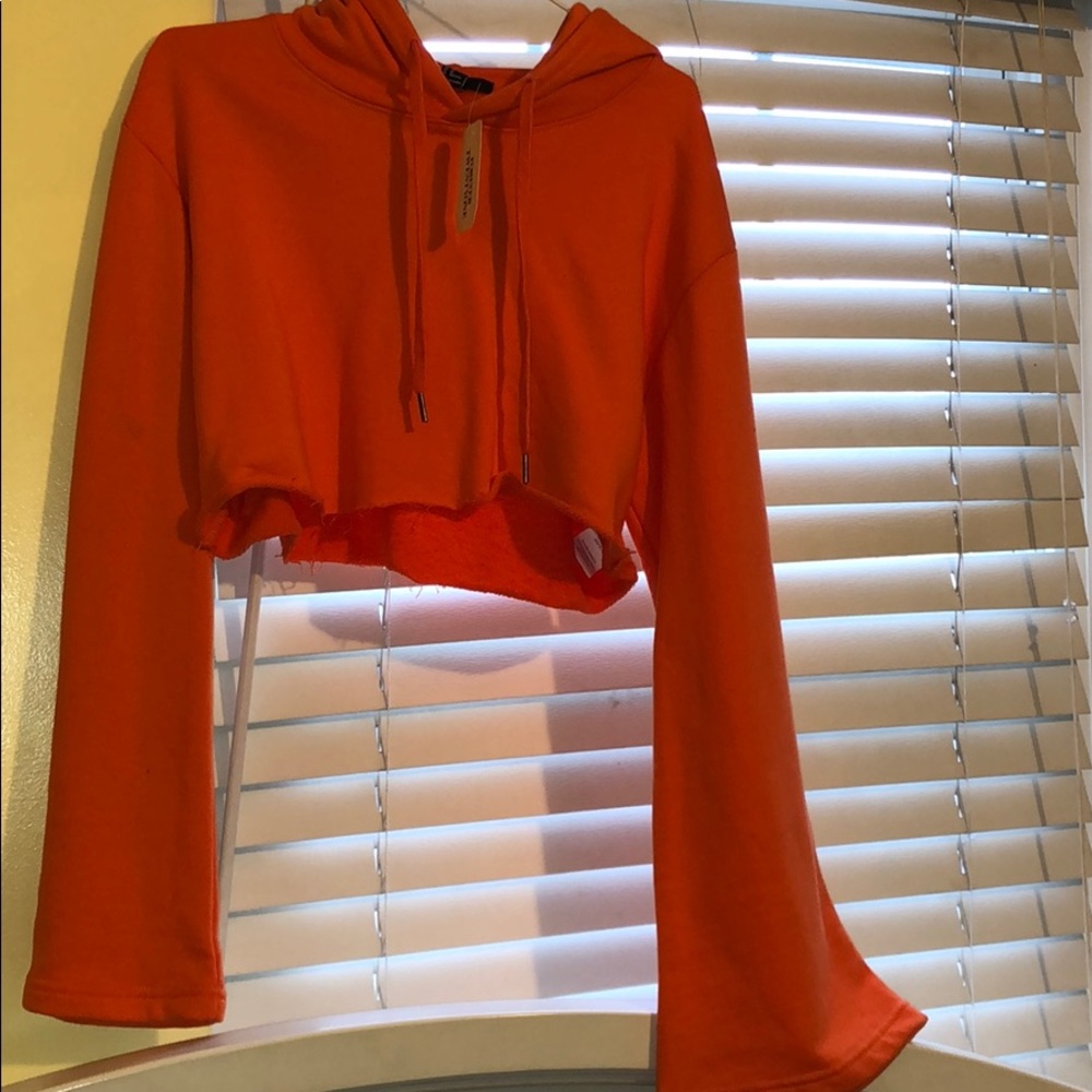 Bell Sleeved Orange Cropped Hoodie.